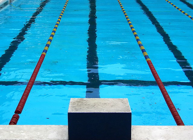 Competition swimming pool block by Rufino Uribe - http://www.flickr.com/photos/rufino_uribe/178577542/. Licensed under Creative Commons Attribution-Share Alike 2.0 via Wikimedia Commons - http://commons.wikimedia.org/wiki/File:Competition_swimming_pool_block.jpg#mediaviewer/File:Competition_swimming_pool_block.jpg